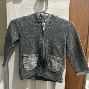 Dark grey zipper jacket with front pockets and hood